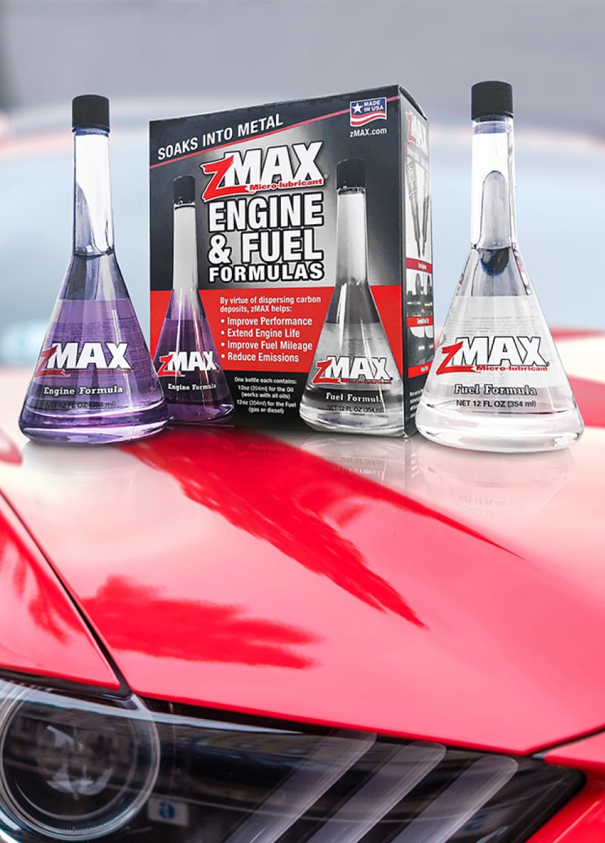 zMax products arranged on hood of sports car