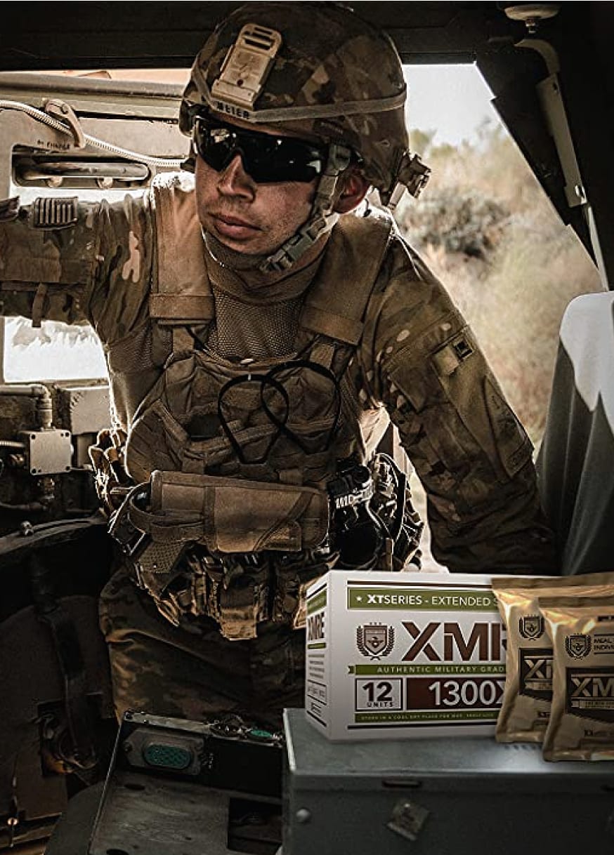 Soldier carrying XMRE meals