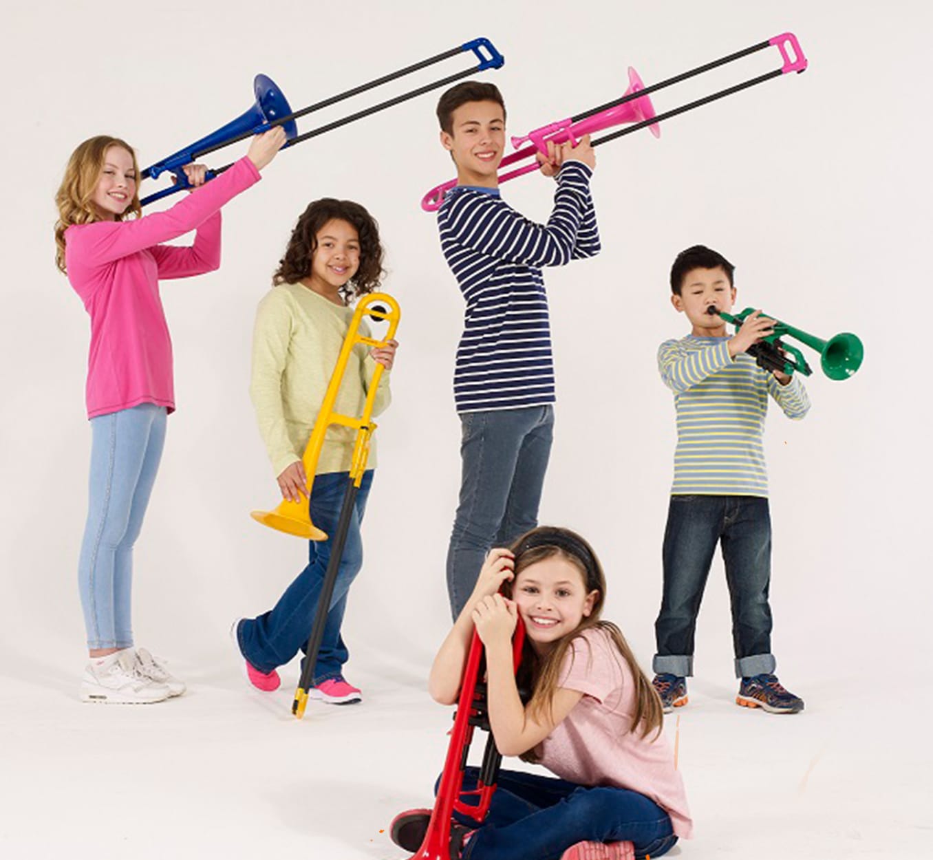 Group of children playing trombone